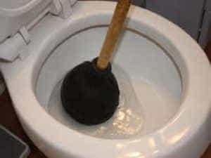 clogged toilet Houston